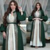 a woman in a green and white dress,muslim garments for women