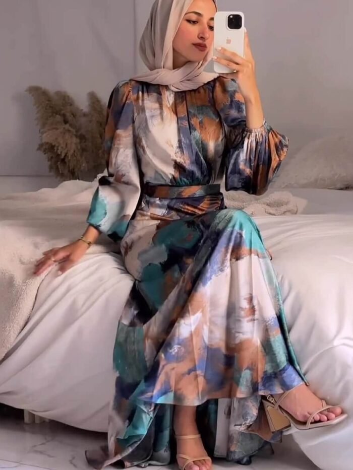 a woman taking a selfie, abaya clothing online
