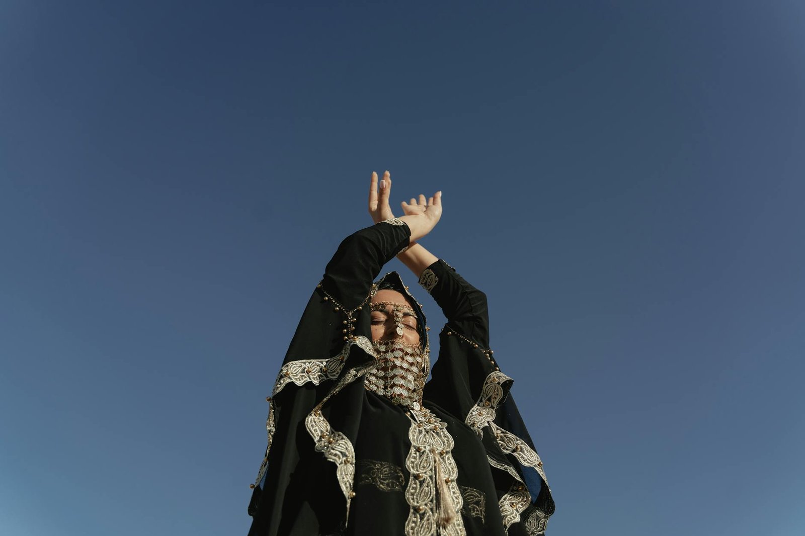 a woman in black abaya