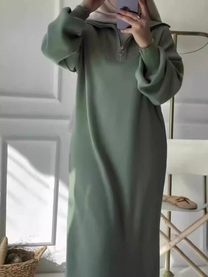 a woman taking a selfie ,Winter dress
