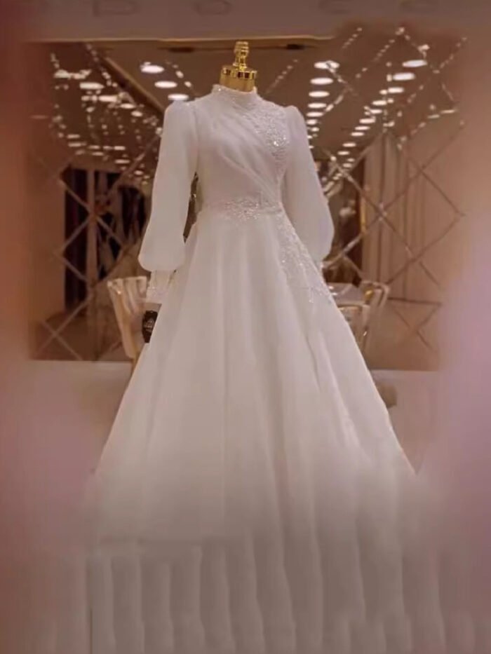 a white dress on a mannequin, islamic bride dress
