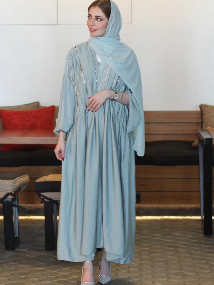 a woman in a long dress fashion abaya dress, Abayas Fashion