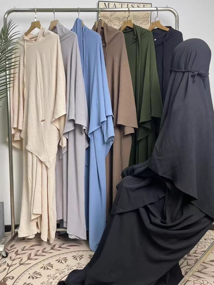 a group of clothes on swingers, fashion jalabiya