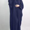 a woman in a blue dress, jilbab