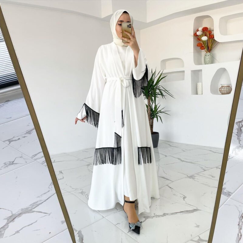Exploring the Advantages of Ordering Abayas Online: Convenience, Variety, and Customization(order abaya online) 5 a woman in a white dress taking a selfie in a mirror, turkish abaya online