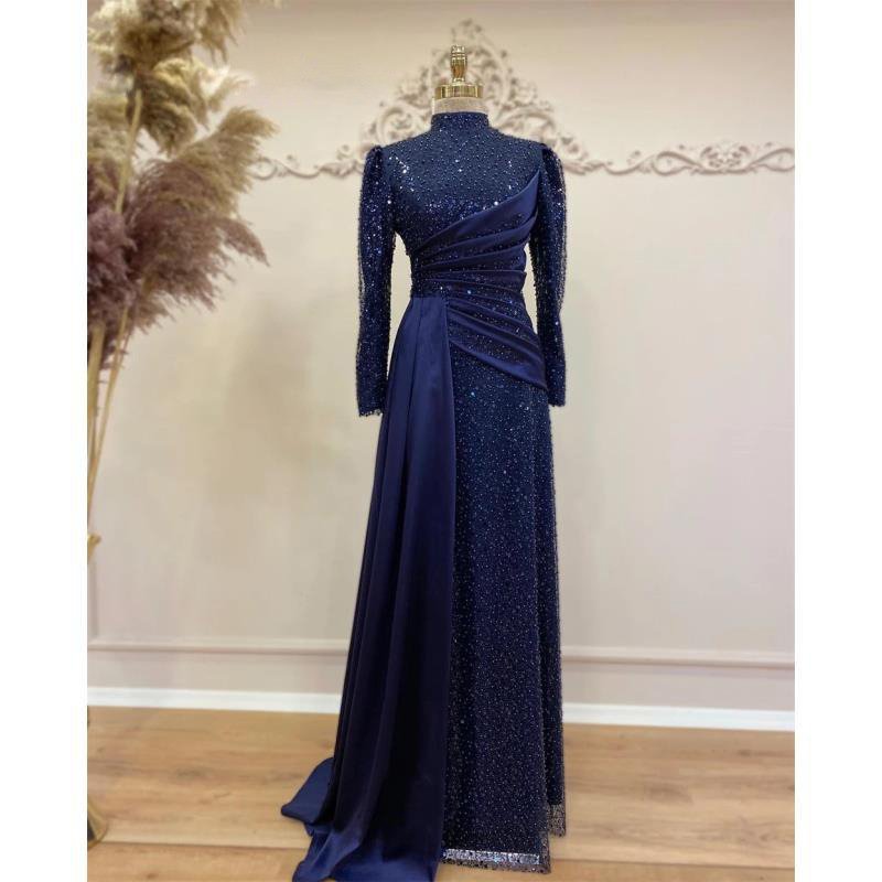 Stylish, Bridal Muslim Dress Options in Dark Blue 4 a dress on a mannequin,