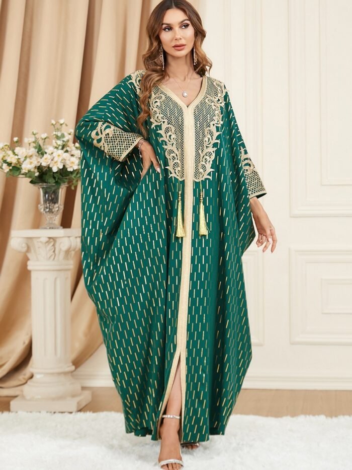 a woman in a green and gold dress,abaya websites