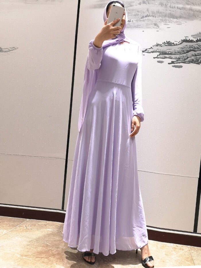 a woman in a dress taking a selfie,abaya fashion online shop