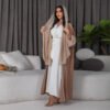 a woman in a white dress,abaya and dresses