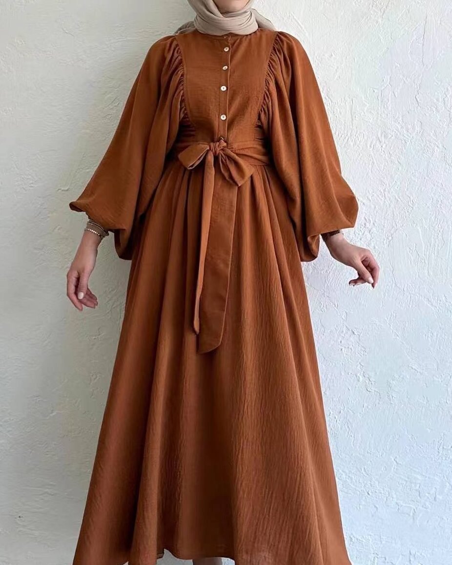 10 Stylish Abaya Designs You Can Buy Online This Season(abaya clothing online) 6 a woman in a brown dress,
abaya clothing online