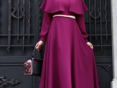 a woman in a long dress, abaya sites