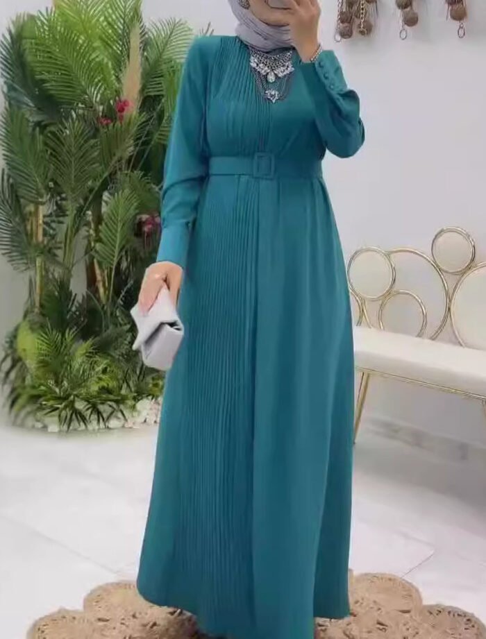 a woman in a blue dress, abaya style latest