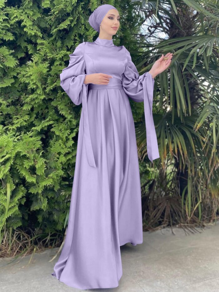 a woman in a long dress, abaya style new