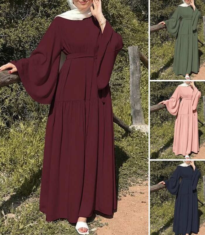 a woman in a long dress, dress chiffon sleeves