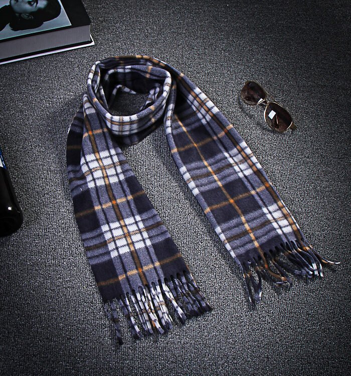 a scarf and sunglasses on a carpet, Men Scarf