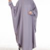 a woman in a long dress, muslim woman's garment