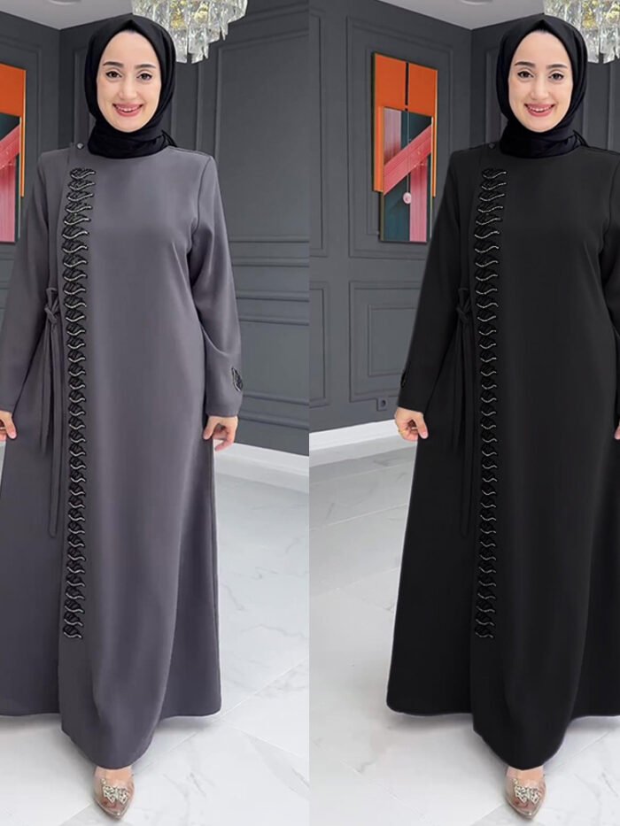 a woman in a black dress, modest formal gowns