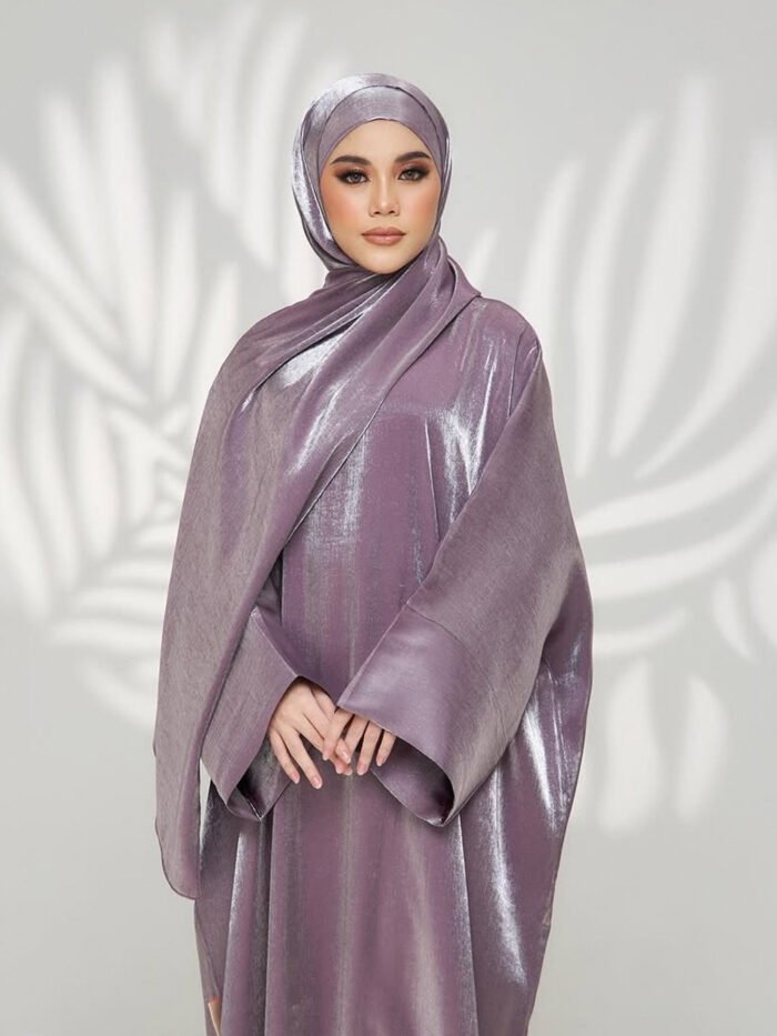 a woman in a purple dress,modest plus size fashion