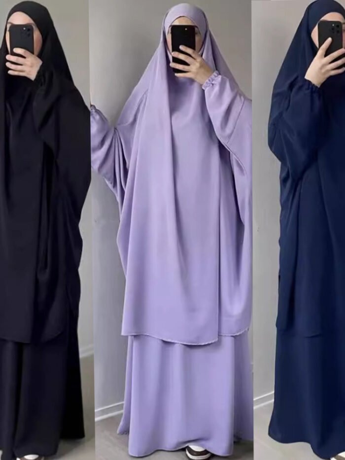 a woman taking a selfie,muslim prom dress