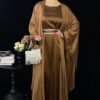 a woman in a brown dress,burka dress