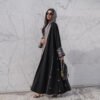 a woman in a long black dress,maxi dresses modest