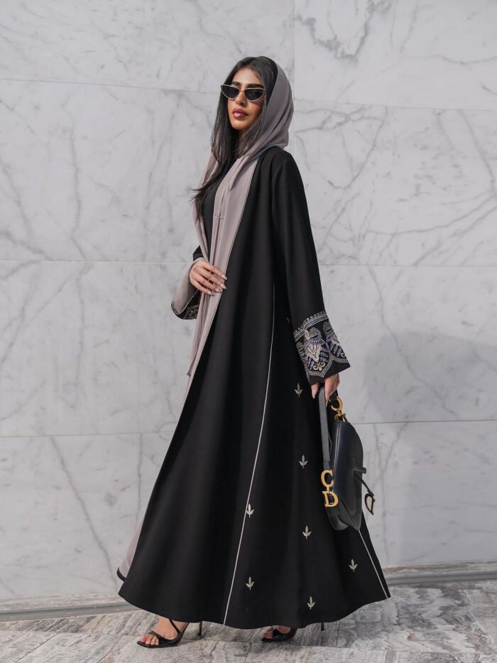 a woman in a long black dress,maxi dresses modest
