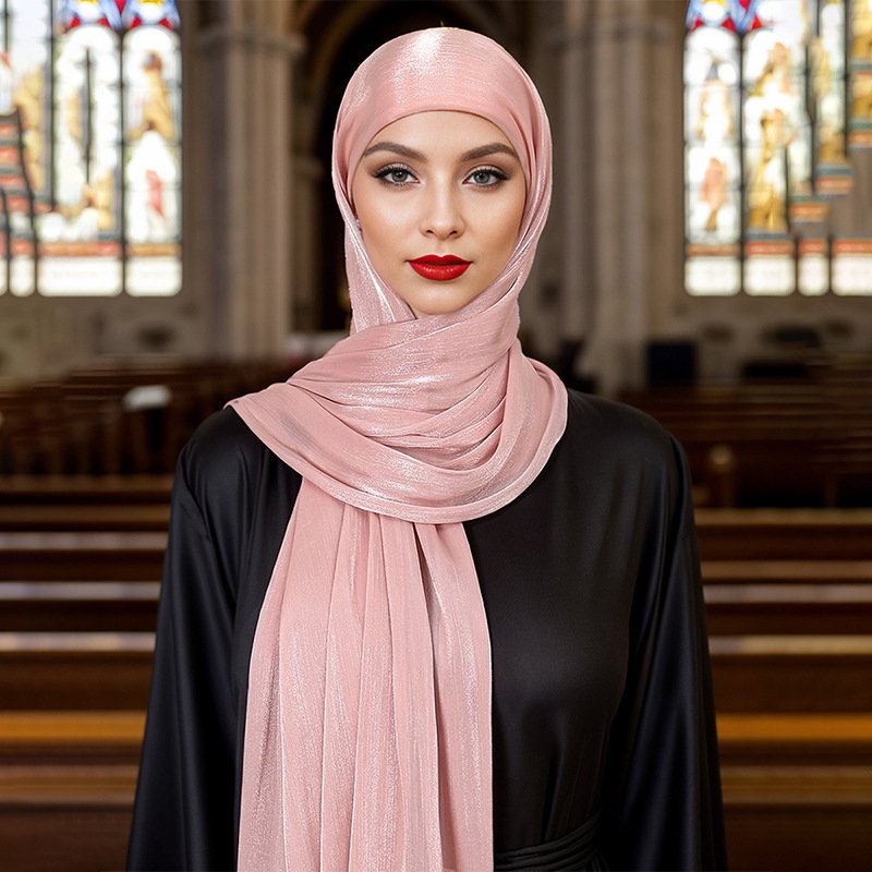 a woman in a pink scarf, headscarf fashion