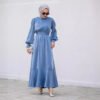 a woman in a blue dress, dress for nikah