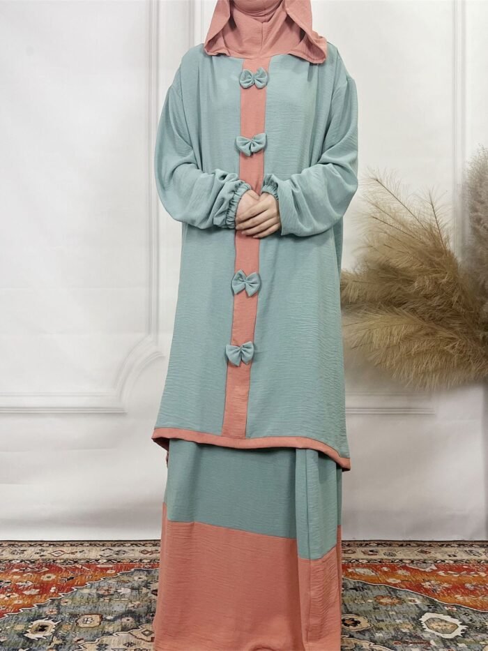 a woman in a dress, abayas store