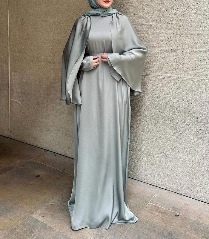 a woman in a long dress, soft dresses