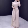 a woman in a white dress, modest activewear