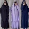 a woman taking a selfie,hijab for fashion