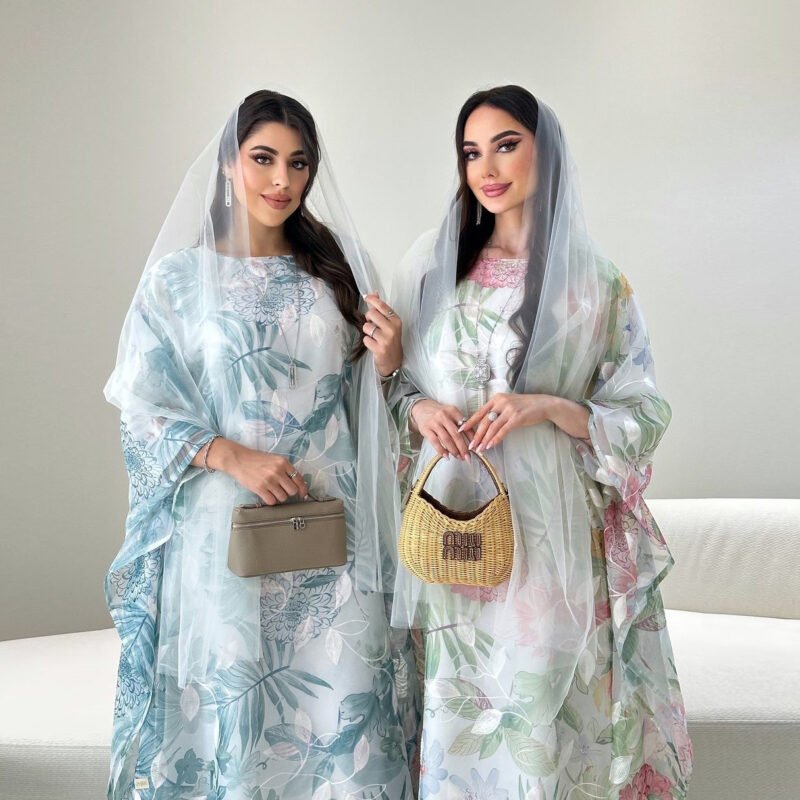 two women wearing Somali Abaya Online UK,
Baati Dress